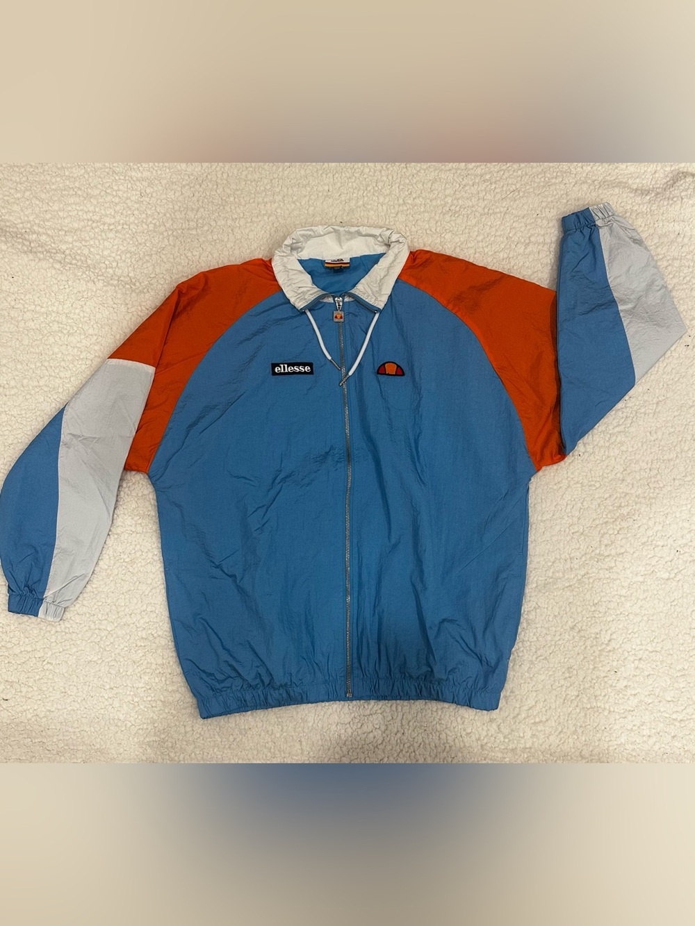 Ellesse Blue, Orange & White Colorblock Windbreaker
#C0022